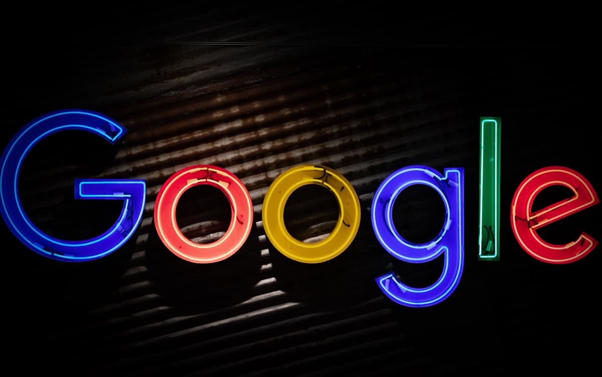 Neon Google sign on dark background